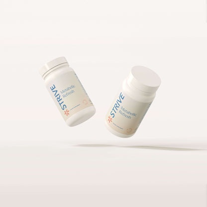 two white bottle of strive pharmacy supplement metabolic refresh