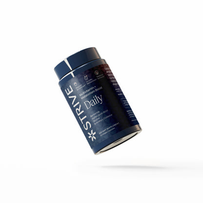 blue supplement bottle labeled 'Daily' a strive pharmacy supplement on a white background